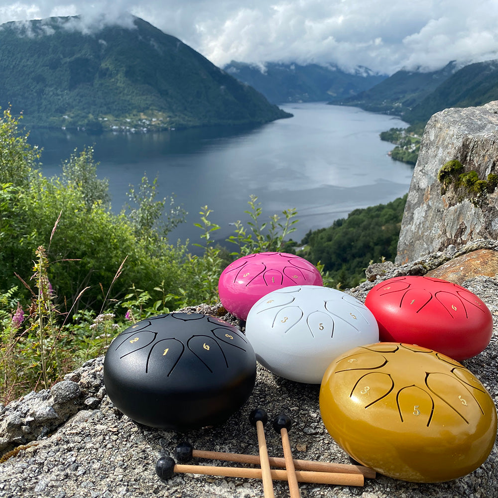 8 Tone 6-inch Steel Tongue Hank Tank Panda Drum Black, White, Pink, Red, Gold on a Mountain Lake Overview